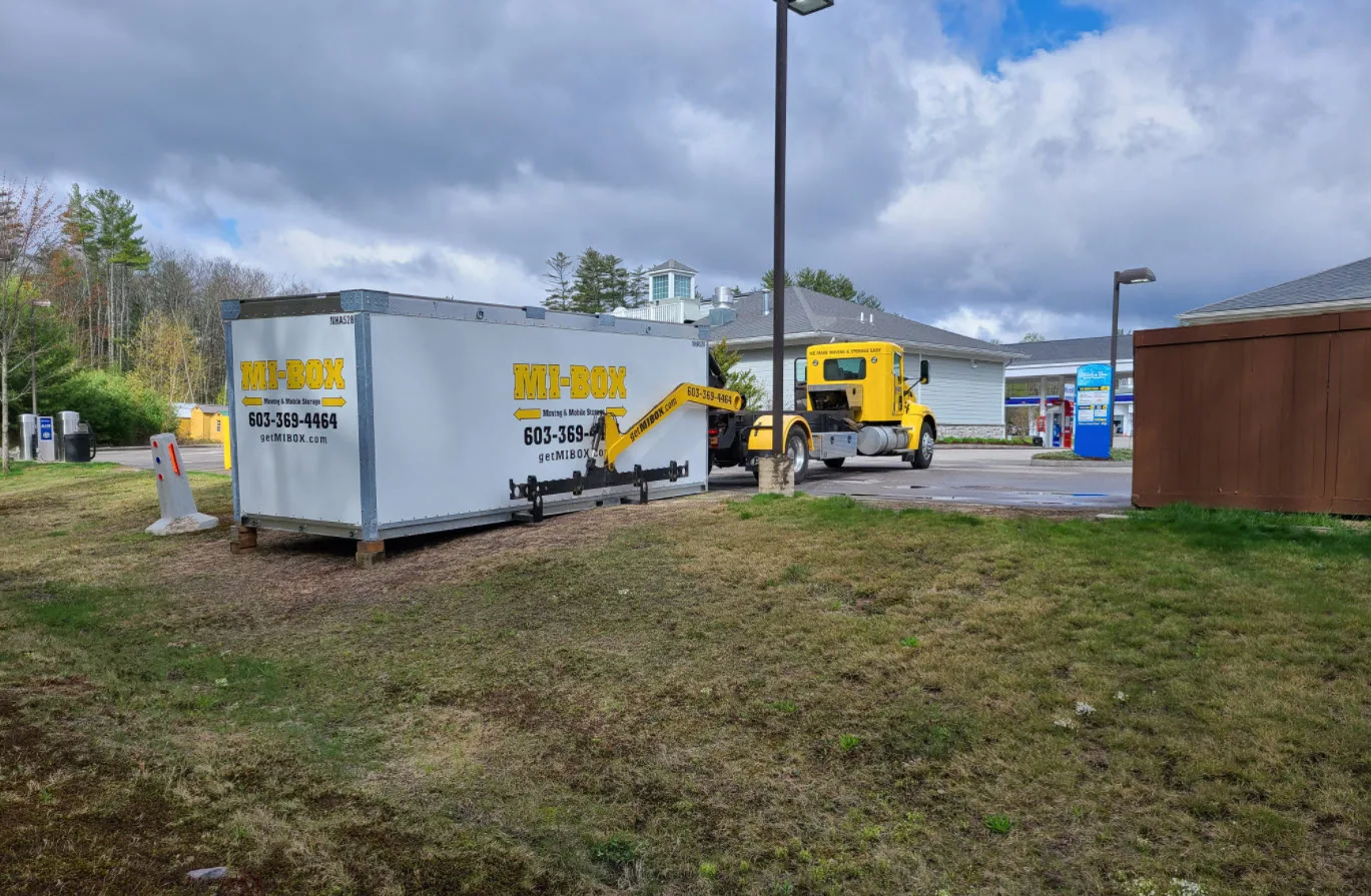 20-foot MI-BOX commercial storage container at a New Hampshire gas station