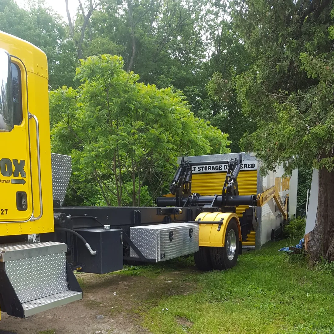 MI-BOX delivering a storage container up a steep New Hampshire driveway