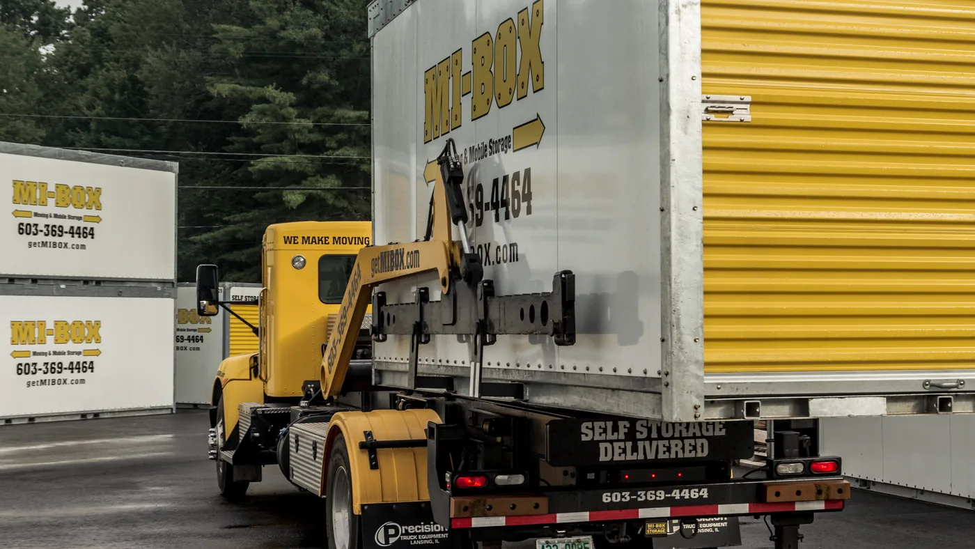 MI-BOX moving and storage container loaded on a delivery truck in New Hampshire