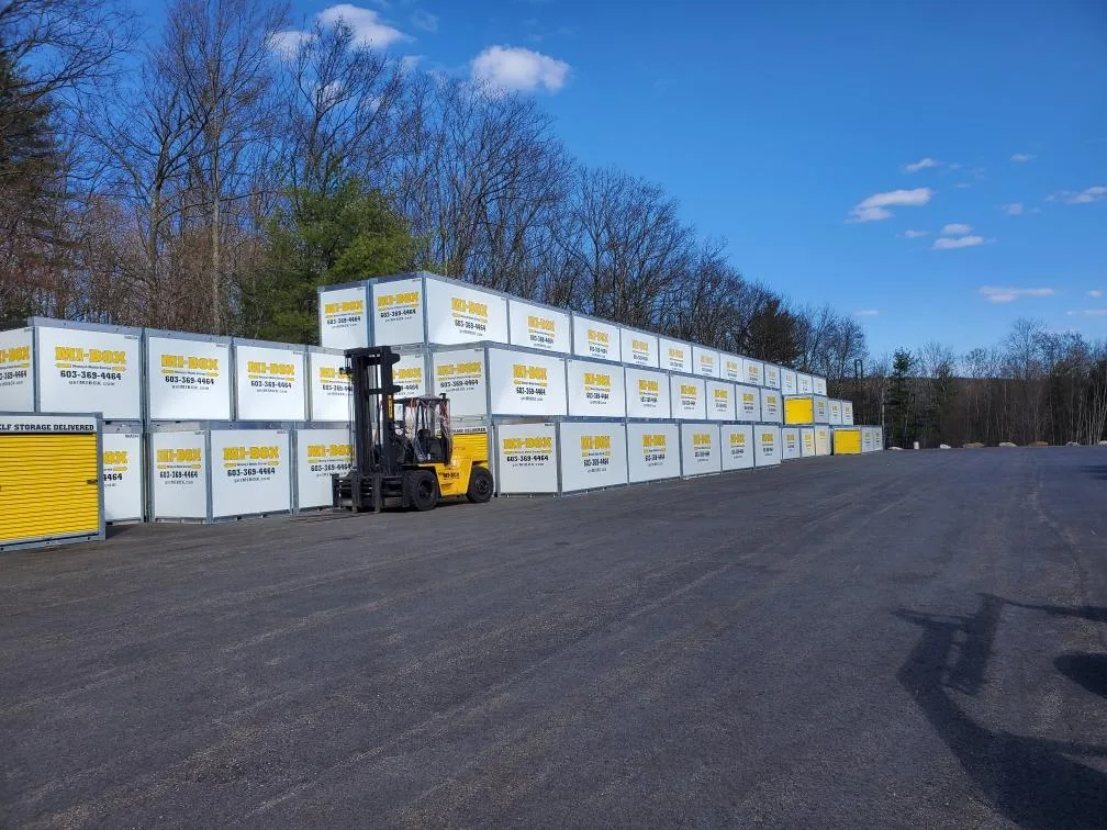 Forklift moving MI-BOX storage containers at the secure Tilton NH facility