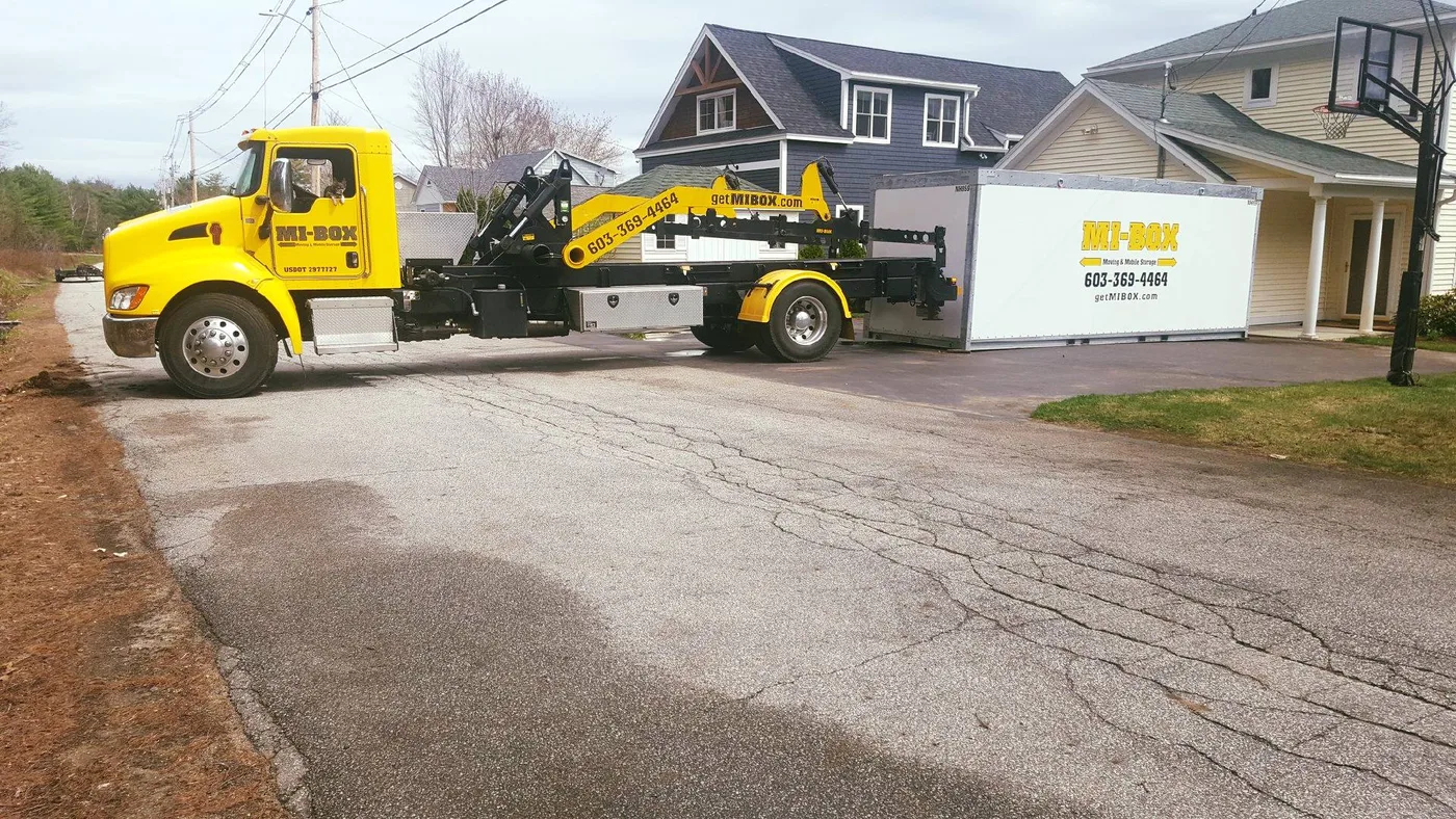 MI-BOX storage container placed in a tight New Hampshire driveway