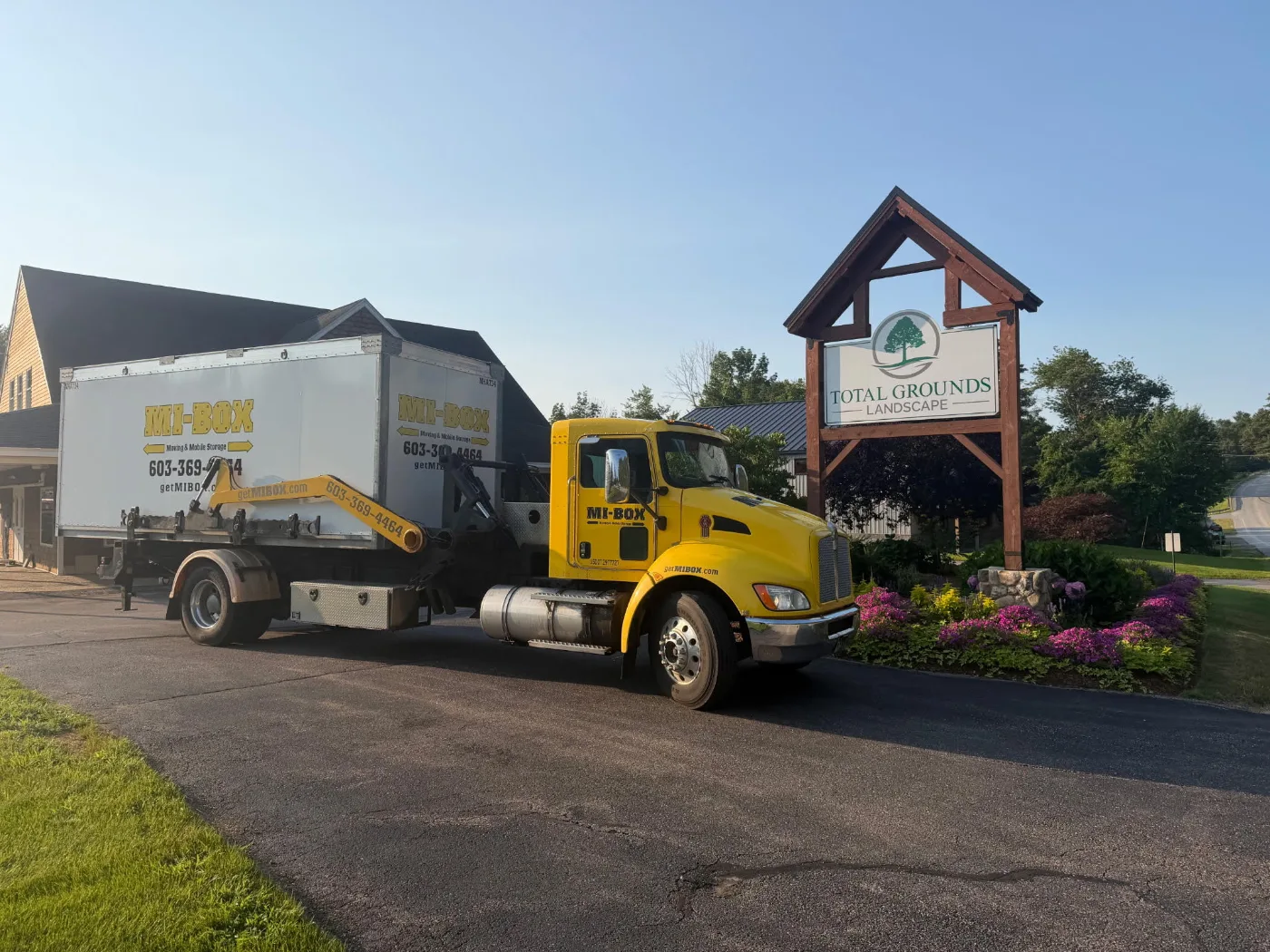 MI-BOX portable storage truck on-site at Total Grounds landscaping in New Hampshire