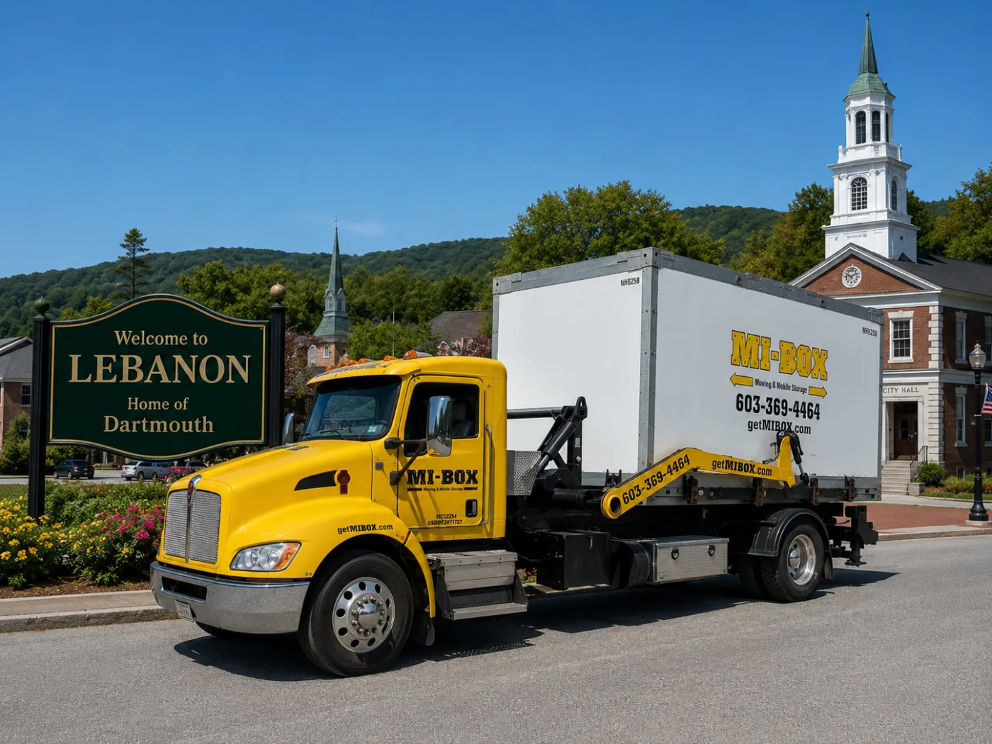 MI-BOX moving truck at the Welcome to Lebanon NH town sign
